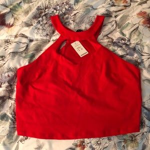 Bebe Cropped Cut Out Top Large